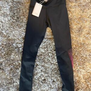 Trendy Black Leggings with Red Detail